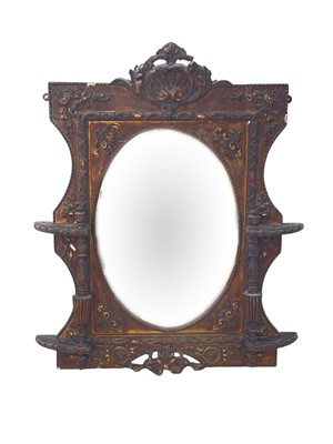 Lot 320 - A Victorian gilt gesso wall mirror.