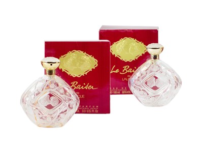 Lot 343 - Lalique - two Le Baisen glass perfume bottles.