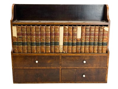 Lot 952 - A late George III mahogany small waterfall bookcase cabinet.