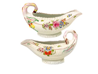 Lot 761 - A pair of Worcester cos leaf sauce boats.