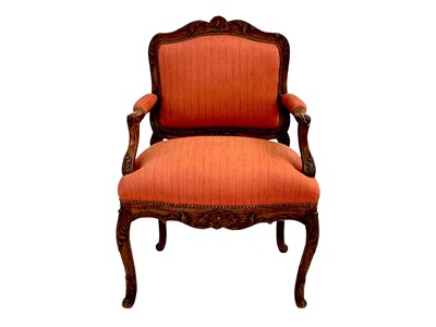 Lot 978 - A French provincial walnut fauteuil.