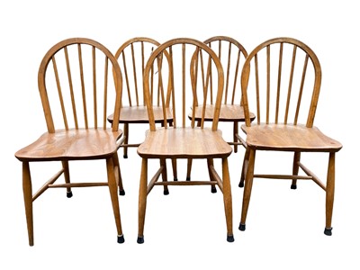 Lot 958 - A set of five Ercol hoop back chairs.