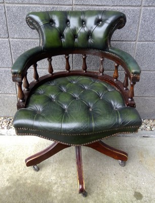 Lot 33 - A Chesterfield Captain's Chair in green Leather.