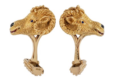 Lot 18 - Kutchinsky - A good pair of 18ct, sapphire set and enamel ram's head design cufflinks.