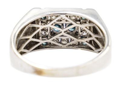 Lot 43 - A white gold, white and blue diamond set, gentleman's ring.