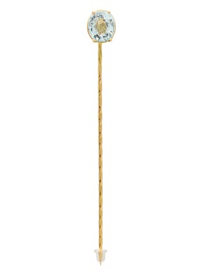 Lot 198 - An 18ct gold 4ct aquamarine set stick pin by James Suddaby.