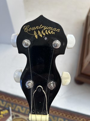 Lot 27 - A Countryman five-string banjo, 94cm, padded...