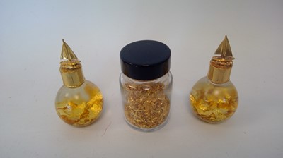 Lot 14 - Three pots of gold leaf, two pots contain liquid.