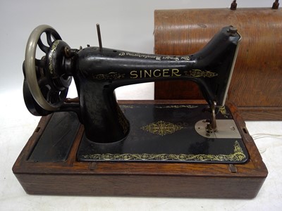 Lot 241 - A Singer sewing machine.