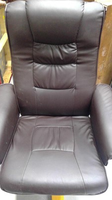 Lot 10 - A faux Leather Swivel Recliner and Stool.