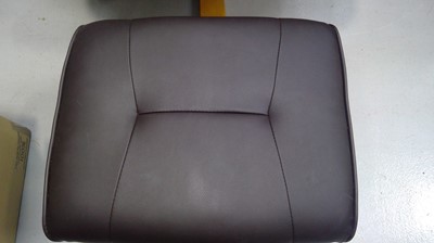 Lot 10 - A faux Leather Swivel Recliner and Stool.