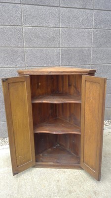 Lot 26 - An Oak, Corner Cupboard. The Cupboard measures...