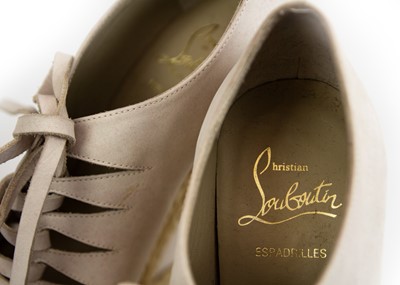 Lot 350 - CHRISTIAN LOUBOUTIN - A pair of 'Viva Boom' calf leather espadrille wedges.
