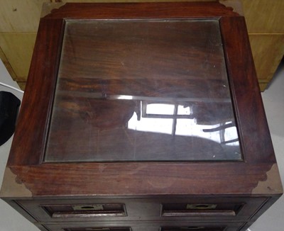 Lot 24 - A Campaign Style, Glass Topped Coffee Table....