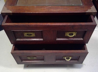 Lot 24 - A Campaign Style, Glass Topped Coffee Table....