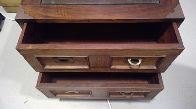 Lot 23 - A Campaign Style, Glass Topped Coffee Table....