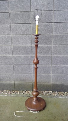 Lot 47 - A Turned Mahogany Lamp Stand. The Stand is...