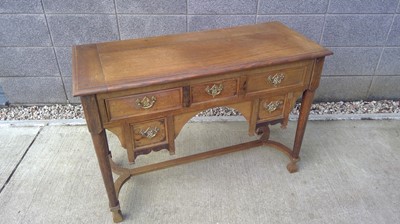 Lot 21 - An Oak, Knee Hole Writing Desk. The Desk...