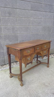 Lot 21 - An Oak, Knee Hole Writing Desk. The Desk...
