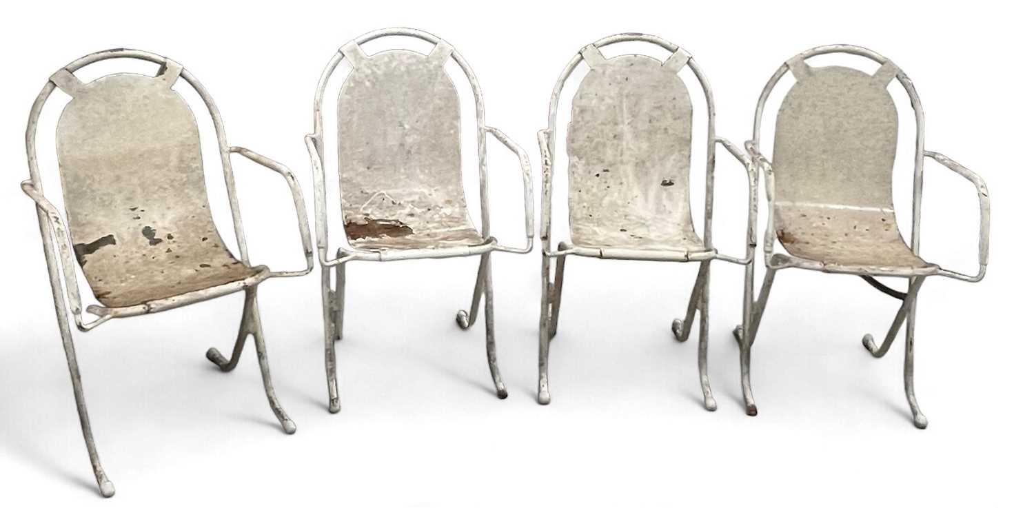 Lot 84 - A set of four 1950s pressed and tubular steel