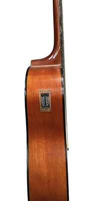 Lot 18 - A Fender DG10CE electro-acoustic guitar,...