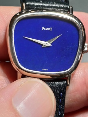 Lot 108 - PIAGET - A 1970's 18ct white gold lapis lazuli dial gentleman's manual wind dress wristwatch.