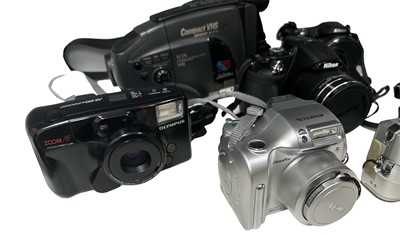 Lot 4 - Eight cameras; Nikon Coolpix P600, Olympus...