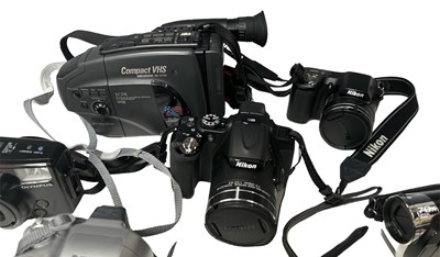 Lot 4 - Eight cameras; Nikon Coolpix P600, Olympus...
