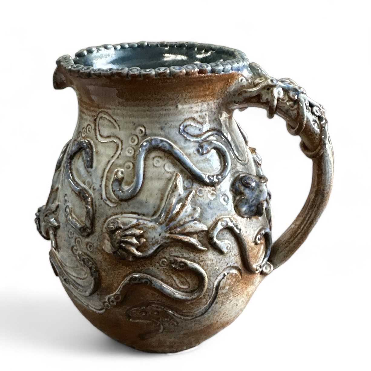 Lot 29 - An art pottery, underwater-themed pitcher...