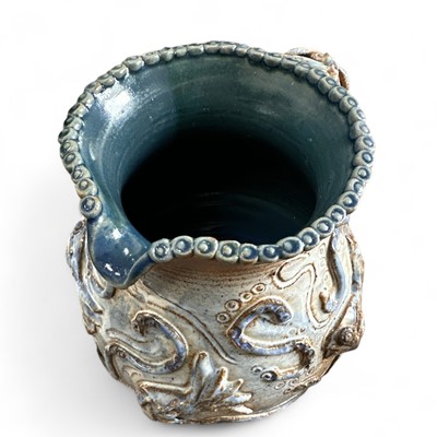Lot 29 - An art pottery, underwater-themed pitcher...