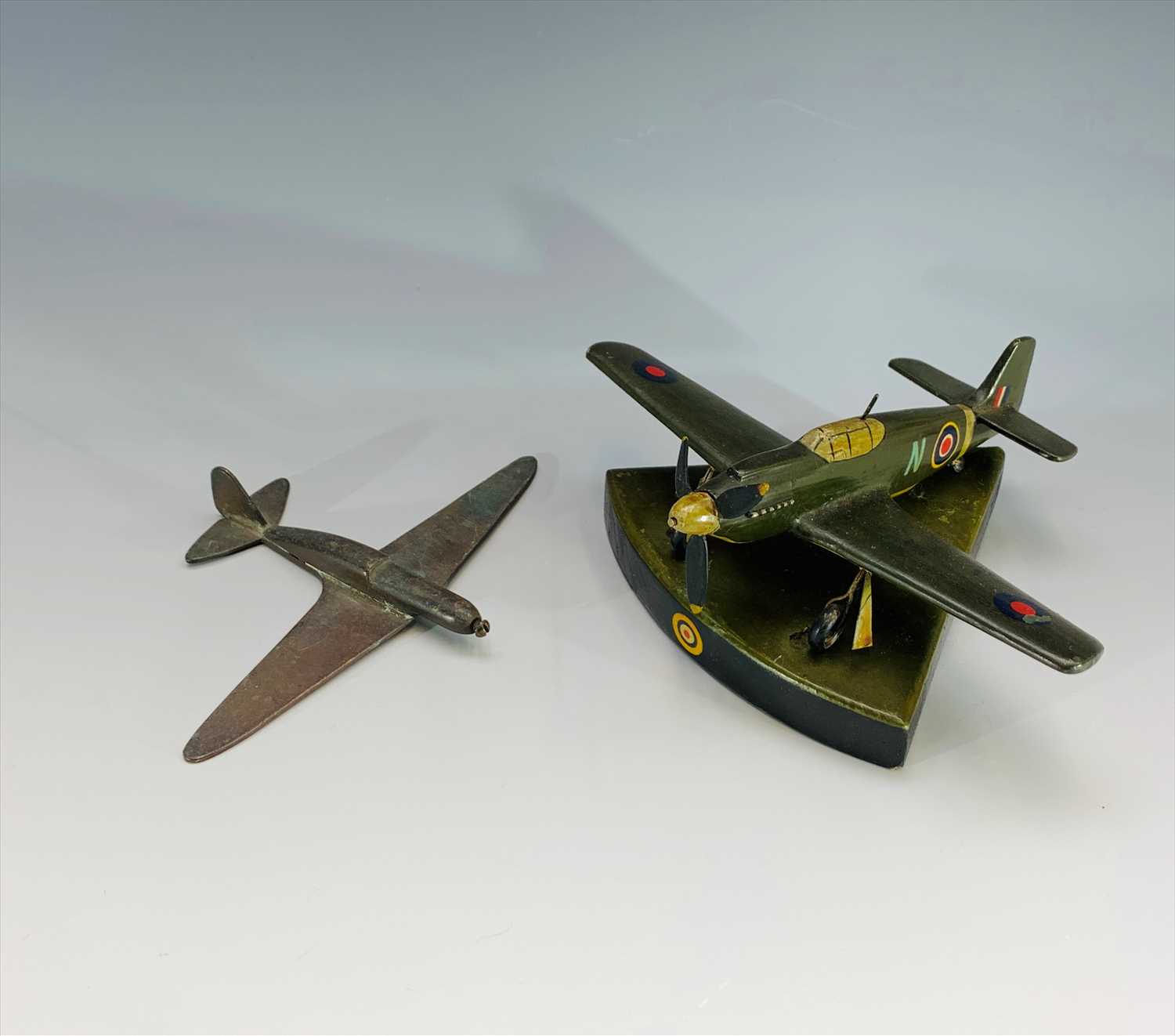 Lot 77 - A carved and painted wood model of a Spitfire,...