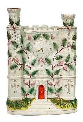 Lot 719 - A Victorian Staffordshire flatback castle spill holder.