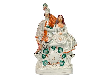 Lot 719 - A Victorian Staffordshire flatback castle spill holder.