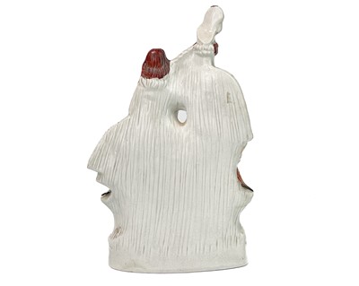 Lot 719 - A Victorian Staffordshire flatback castle spill holder.
