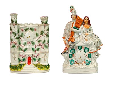 Lot 719 - A Victorian Staffordshire flatback castle spill holder.