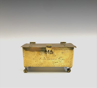 Lot 53 - A Georgian brass table snuff box on four ball...