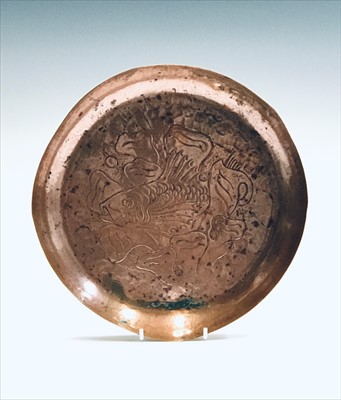 Lot 62 - A Newlyn copper circular dish decorated with a...