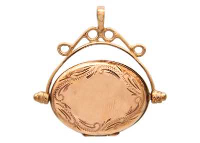 Lot 8 - A 9ct hallmarked rose gold swivel locket pendant.