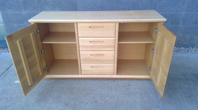 Lot 15 - A Blonde Oak Sideboard. The Sideboard measures...