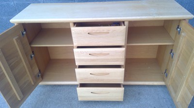 Lot 15 - A Blonde Oak Sideboard. The Sideboard measures...