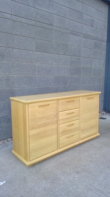 Lot 15 - A Blonde Oak Sideboard. The Sideboard measures...