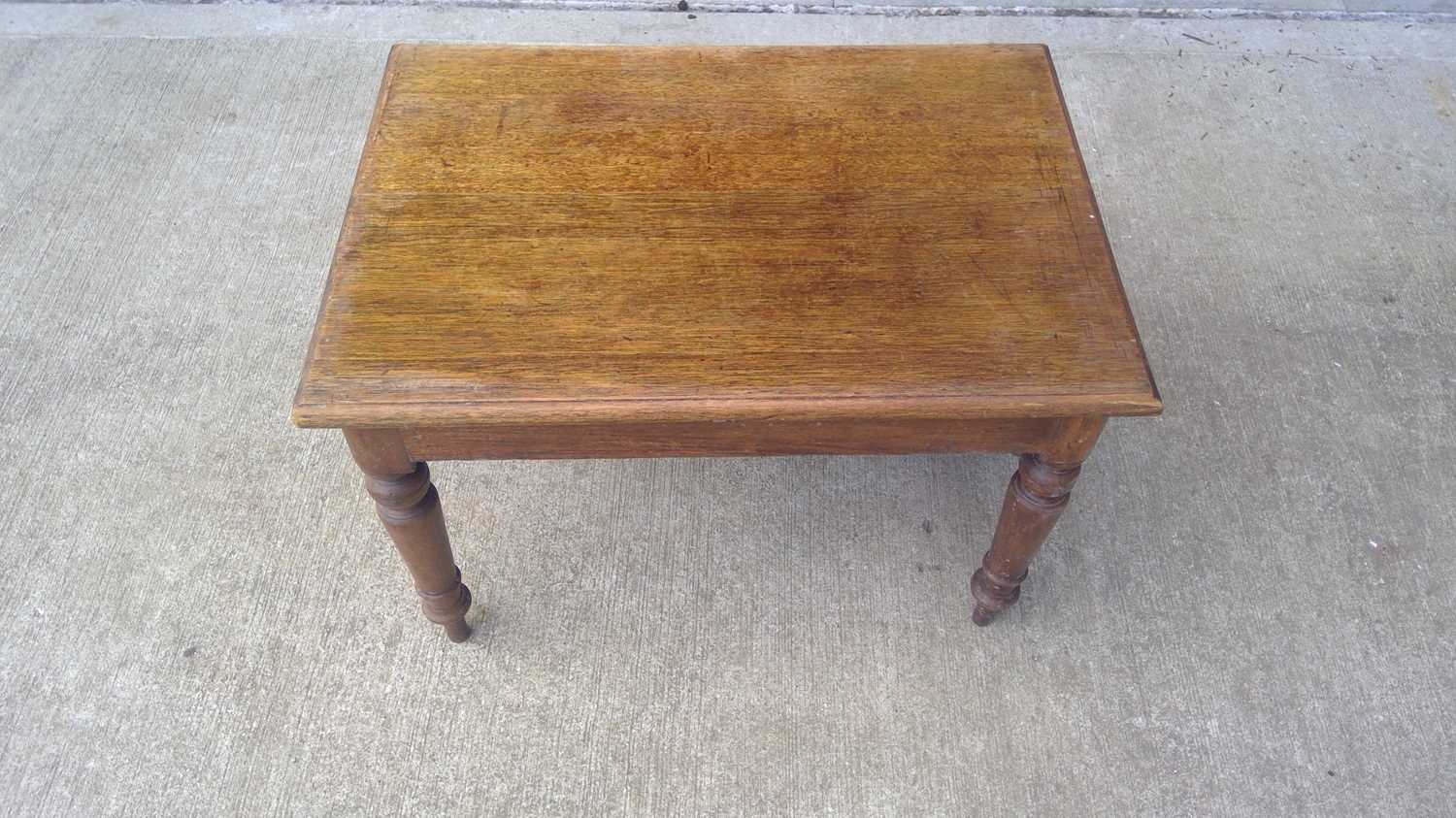 Lot 28 - A Coffee Table. The Table measures 70cm wide...
