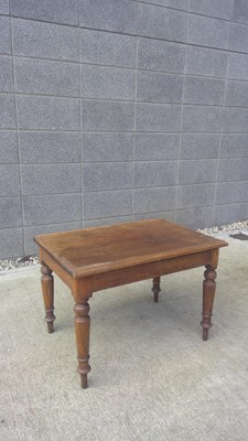 Lot 28 - A Coffee Table. The Table measures 70cm wide...