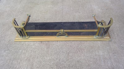 Lot 16 - A Brass Fender. The Fender measures 132cm wide...