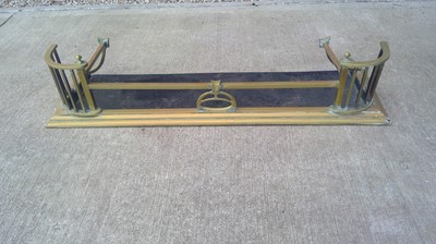 Lot 16 - A Brass Fender. The Fender measures 132cm wide...