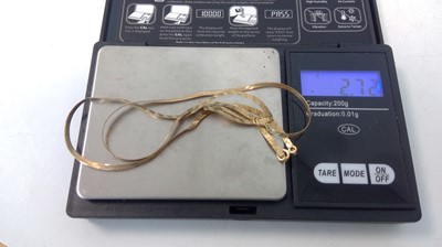 Lot 1 - A 9ct gold necklace in the shape of a tie...
