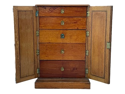 Lot 899 - An estate office chest