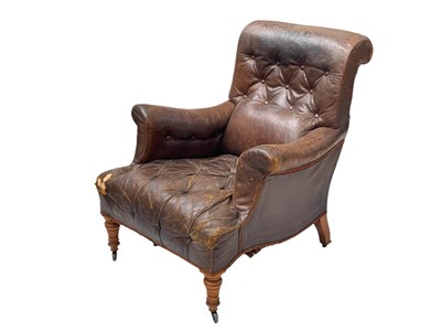 Lot 991 - A Victorian walnut framed leather upholstered armchair.