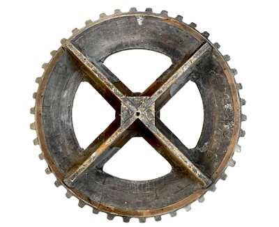 Lot 45 - A large gray painted hardwood cog pattern.