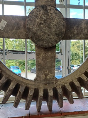 Lot 45 - A large gray painted hardwood cog pattern.